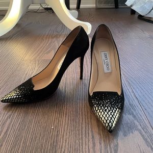 Black suede Jimmy Choo pumps with gold/silver toe